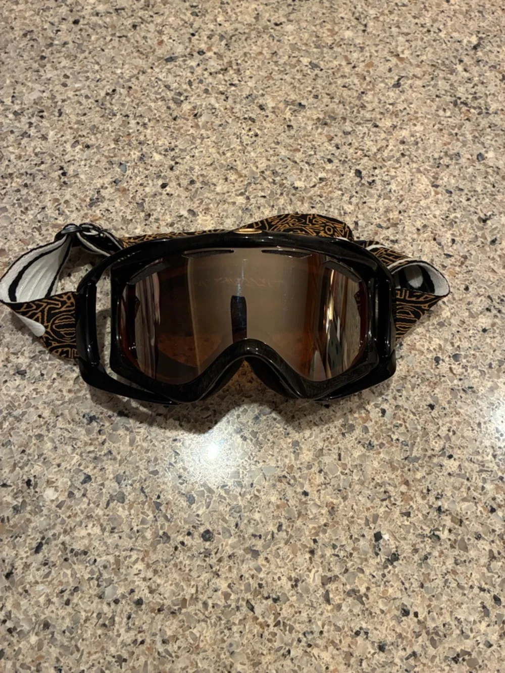 Oakley Splice Goggles Gold Black Frame Persimmon with patterned strap